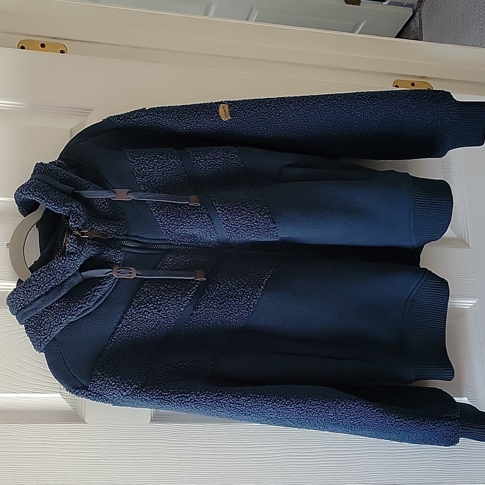 Dusk blue colored Women's size large Koolaburra by UGG zip up jacket with hood.